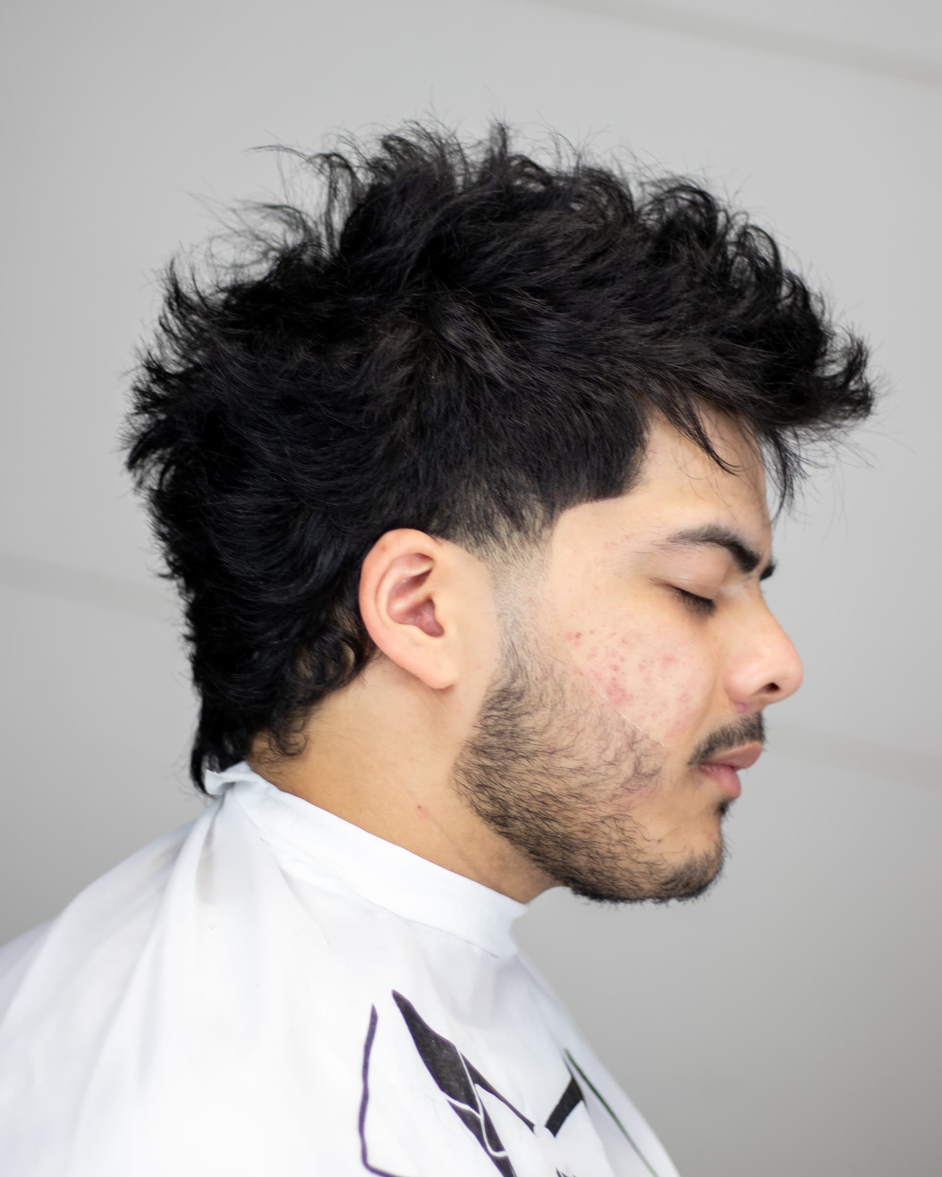 Mid fade with a scissor-cut top